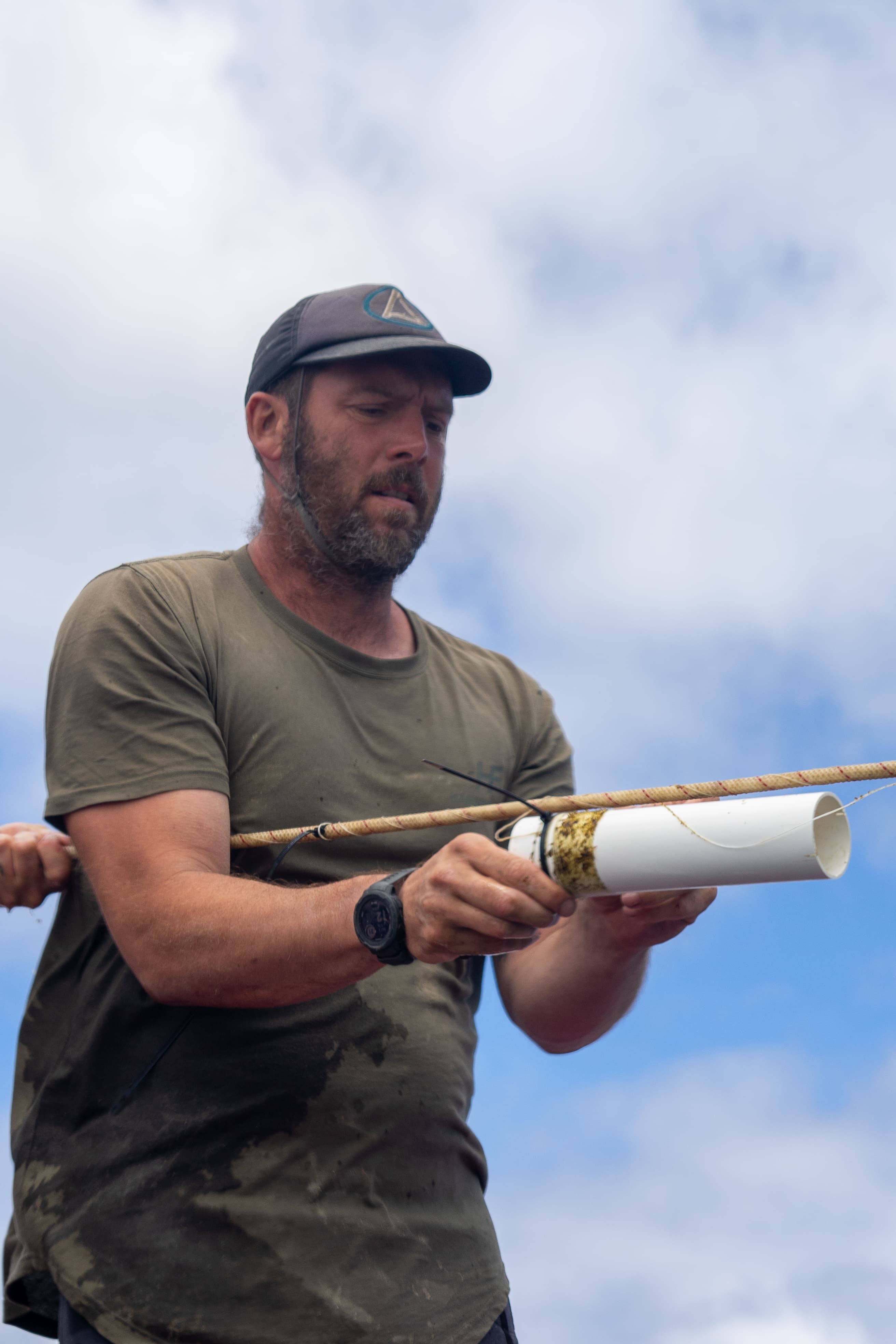Seeding kelp lines from the boat